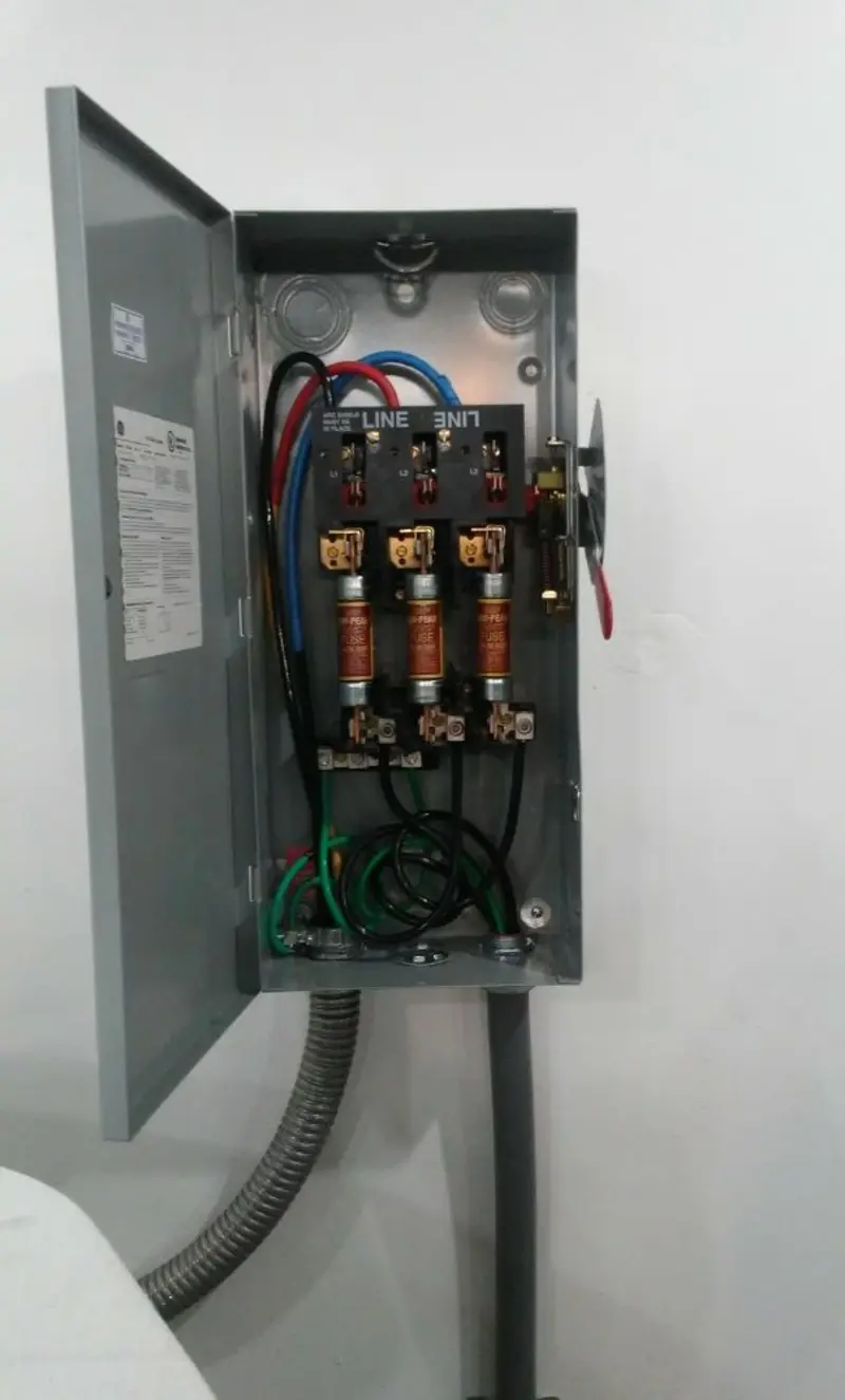 Three-phase disconnect switch installed for Smoke Detector Installation in Ault